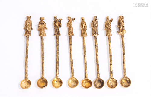 A GROUP OF GILT BRONZE SPOONS CARVED EIGHT IMMORTALS