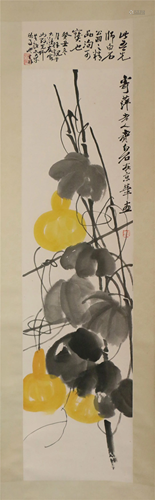 A CHINESE SCROLL PAINTING OF GOURDS WITH INSCRIPTIONS