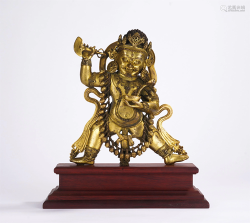 A CHINESE GILT BRONZE FIGURE OF TIBETAN BUDDHA