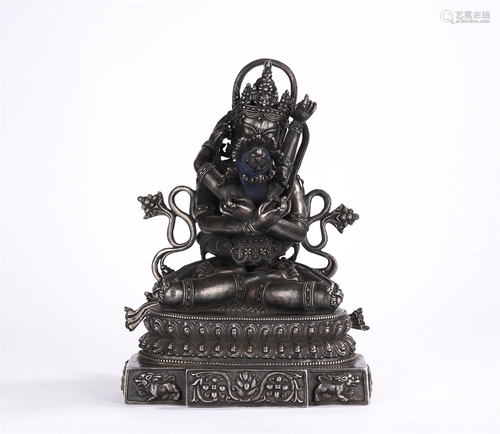 A CHINESE SILVER FIGURE OF BUDDHA