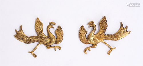 A PAIR OF CHINESE GILT BRONZE PHOENIX DECORATIONS