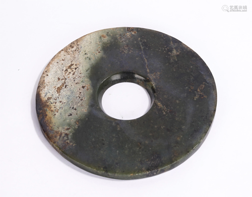 A CHINESE CIRCULAR JADE BI