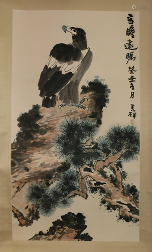 A CHINESE SCROLL PAINTING OF EAGLE AND PINE