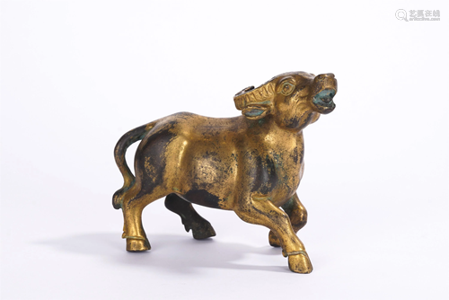 A CHINESE GILT BRONZE BUFFALO PAPERWEIGHT