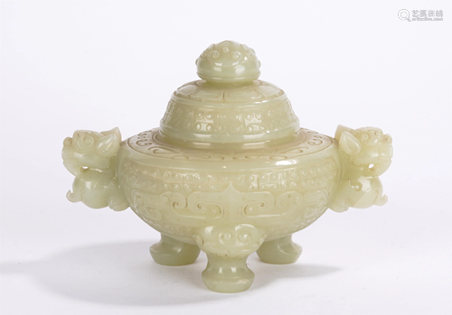 A CHINESE WHITE JADE TRIPOD CENSER WITH DOUBLE HA…