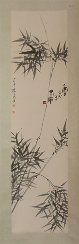 A CHINESE SCROLL PAINTING OF BAMBOO