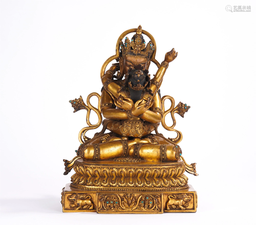 A CHINESE GILT BRONZE SEATED FIGURE OF BUDDHA