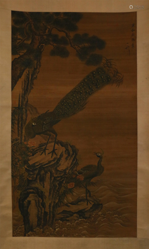 A CHINESE SCROLL PAINTING OF PEACOCKS AND PLANTS