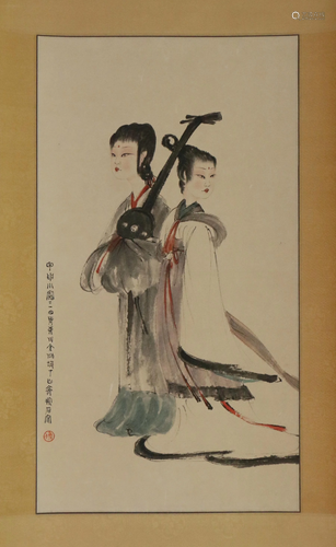 A CHINESE SCROLL PAINTING OF TWO LADIES