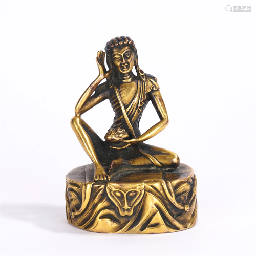 A CHINESE BRONZE SEATED FIGURE OF BUDDHA