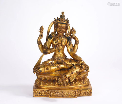 A CHINESE GILT BRONZE SEATED FIGURE OF BUDDHA