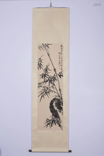 A CHINESE SCROLL PAINTING OF BAMBOO AND ROCK