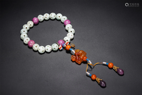 A CHINESE 18-BEAD HOLLOW-OUT JADEITE PRAYER BEADS