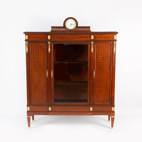 A NAPOLEON III STYLE HARDWOOD BOOK CABINET WITH…