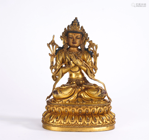 A CHINESE GILT BRONZE SEATED FIGURE OF BUDDHA