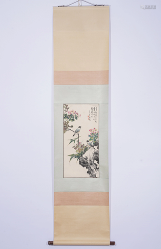 A CHINESE SCROLL PAINTING OF FLOWERS AND BIRDS