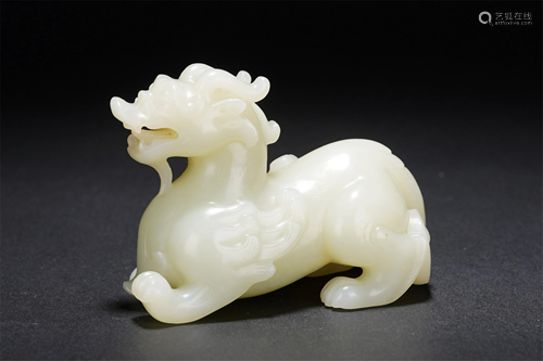 A CHINESE WHITE JADE CARVED DECORATION OF KYLIN