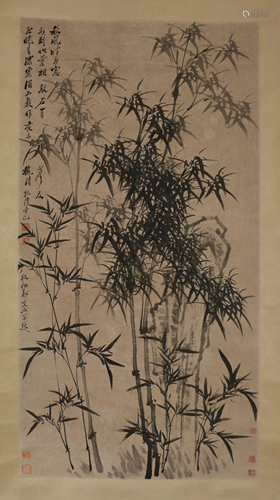 A CHINESE SCROLL PAINTING OF BAMBOO AND ROCK