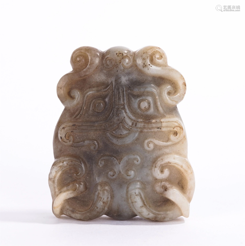 A CHINESE JADE BEAST PENDANT