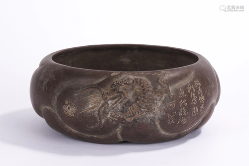 A CHINESE INSCRIBED YIXING CLAY DRAGON BRUSH WAS…