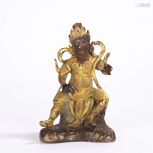 A CHINESE GILT BRONZE FIGURE OF BUDDHA