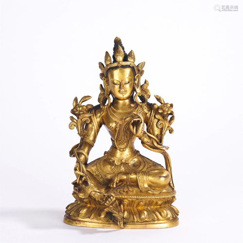 A CHINESE GILT BRONZE SEATED FIGURE OF BUDDHA