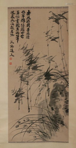 A CHINESE SCROLL PAINTING OF BAMBOO AND ORCHID