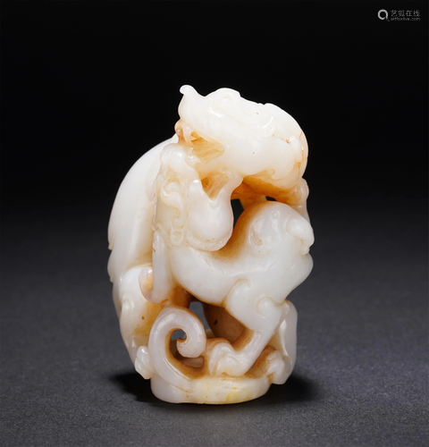 A CHINESE WHITE JADE CARVED DRAGON PENDANT