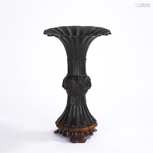 A CHINESE BRONZE CHI-DRAGON GU VASE