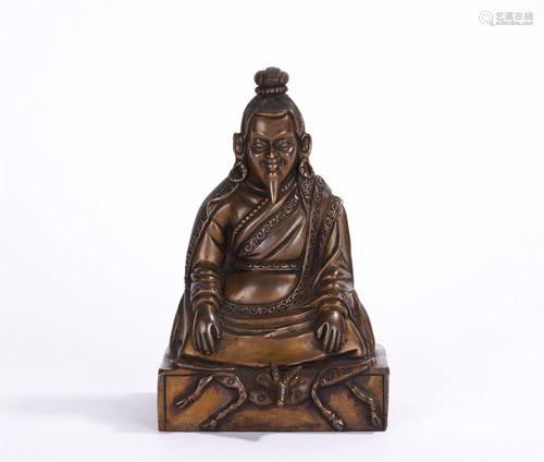 A CHINESE BRONZE SEATED FIGURE OF BUDDHA