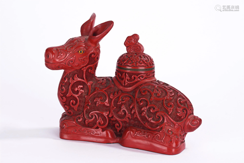 A CHINESE CARVED RED LACQUER MYTHICAL BEAST BOX & …