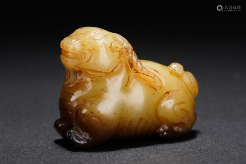 A CHINESE WHITE JADE CARVED DECORATION OF MYTHICAL