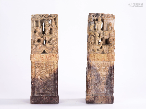 A PAIR OF CHINESE SOAPSTONE CARVED FIGURAL COL…