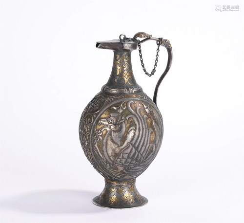 A CHINESE SILVER EWER INCISED WITH PHOENIX