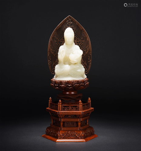 A CHINESE WHITE JADE SEATED BUDDHA AND BUDDHA PED…