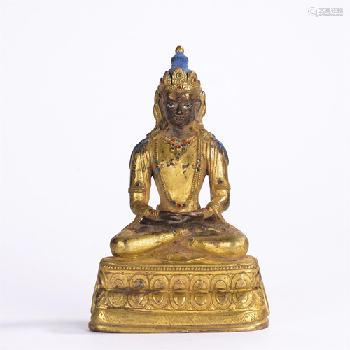 A CHINESE HARD-STONES INLAID GILT BRONZE FIGURE OF