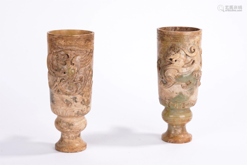 A PAIR OF CHINESE JADE DRAGON CUPS