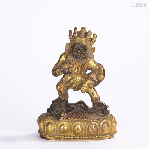 A CHINESE GILT BRONZE STANDING FIGURE OF TIBETAN BUD…