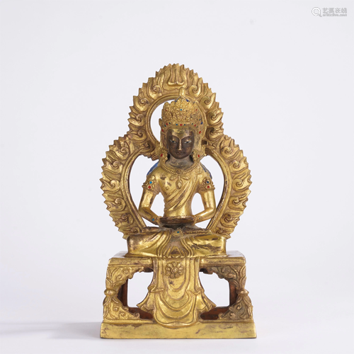 A CHINESE GILT BRONZE SEATED FIGURE OF BUDDHA