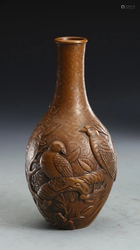 A BRONZE CARVING 'BIRD AND FLOWER' VASE