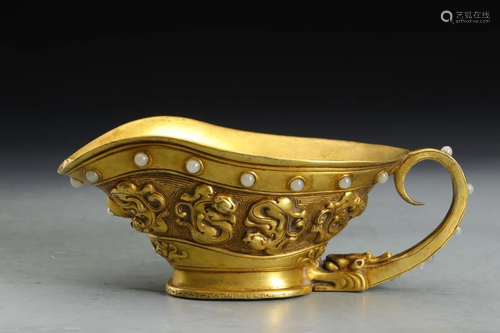 A GILT SILVER JADE INLAID 'DRAGON' BRONZE JUE CUP