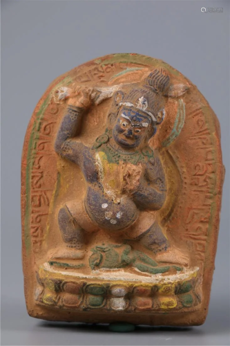 A CLAY TSHA-TSHA OF VAJRAPANI BUDDHA
