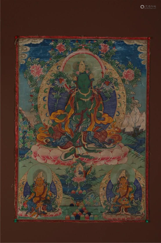 A GREEN TARA BUDDHA THANGKA.