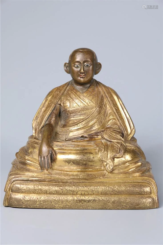 A GILT BRONZE GURU BUDDHA STATUE, MING DYN.