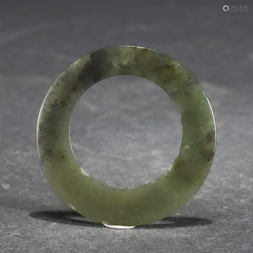 A CHINESE CIRCULAR JADE BI