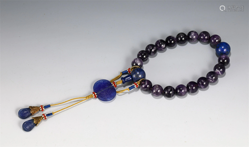 A CHINESE PURPLE CRYSTAL PRAYER BEADS