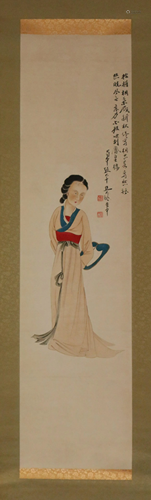 A CHINESE FIGURE SCROLL PAINTING OF A LADY