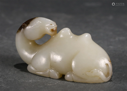 A CHINESE JADE CARVED CAMEL