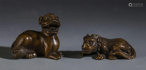 A PAIR OF CHINESE BRONZE BEAST DECORATIONS