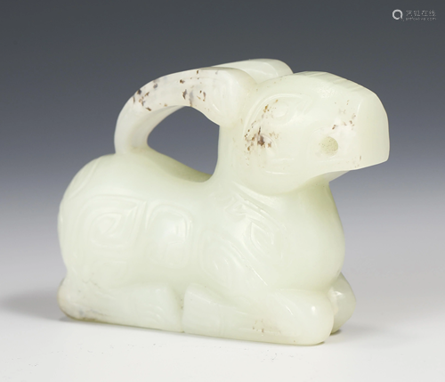 A CHINESE JADE CARVED MYTHICAL BEAST